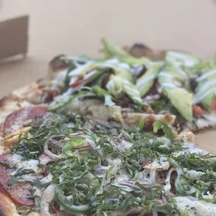 Half California half pepperoni basil pizza I can't remember the name of