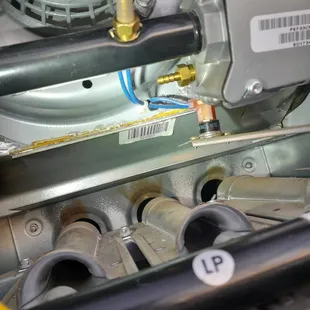 Barbed port left in black line. Used to measure gas pressure.