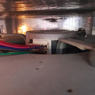 Fire damage inside unit after 2nd technician tried to restart with barbed port still in the gas line.