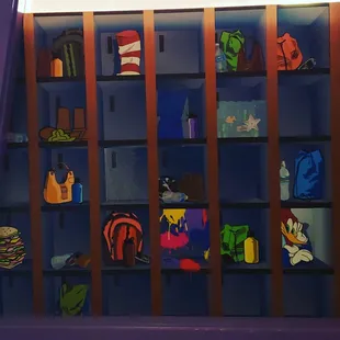 a shelf full of comic books