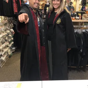 Caught this couple walking out in their new Hogwarts robes come get them at Comis-N-Stuff