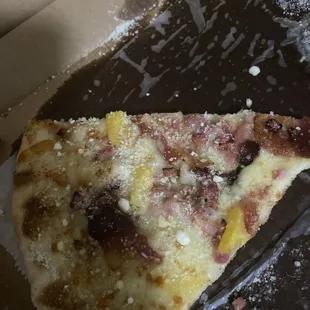 White pizza with bacon (over cooked and unsatisfying) ham  (somewhere.  Not sure where but it&apos;s supposed to be there) and pineapple