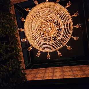 a chandelier hanging from the ceiling