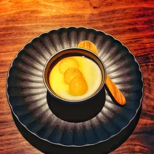 Pre dessert...kumquats, almond tofu, ginger syrup...lovely