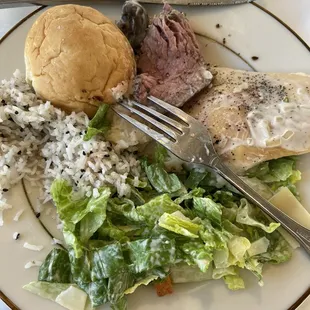 Lemon rice, champagne chicken, brisket and Caesar salad