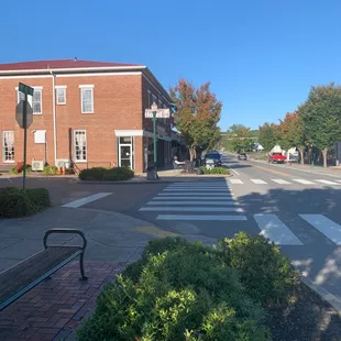 a bench on the sidewalk