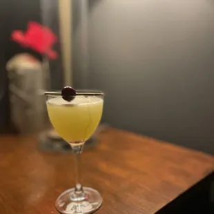 a cocktail in a glass on a table
