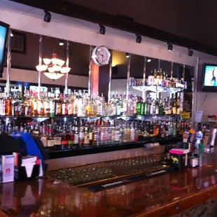 a bar with a large television