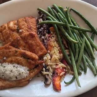 Parmesan-crusted white fish with a delightful orzo pasta and lobster. It was served with green beans and lemon-chive butter.