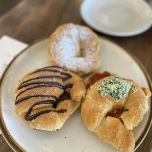 three pastries on a plate