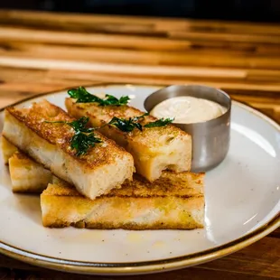 a plate of breaded tofu