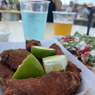 Chile limón wings and birria tater tots. So good