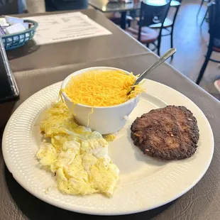 Two egg breakfast with grits and hot sausage