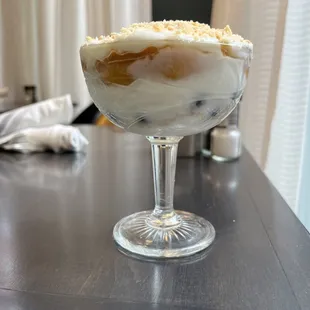 a dessert in a glass on a table