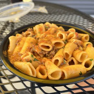 a bowl of pasta on a table
