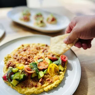 CURRIED HUMMUS - warm masala spices, mango chutney, dill + coriander kachumber, crispy chickpeas, warm naan