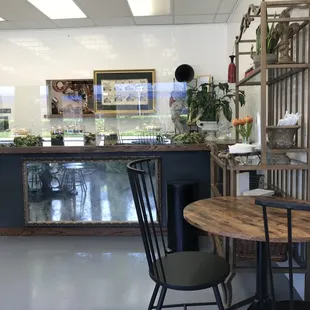 a table and chairs in a restaurant
