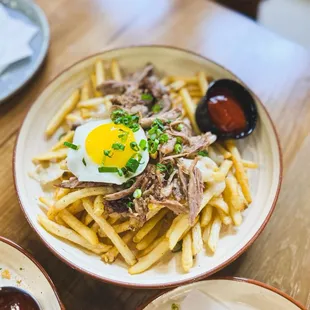 Duck fat fries is a must order.