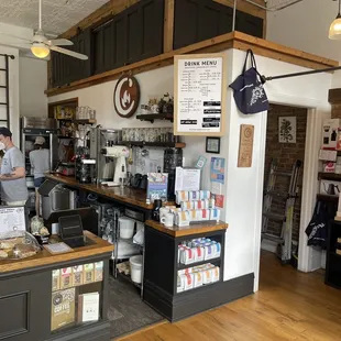 a man working in a coffee shop