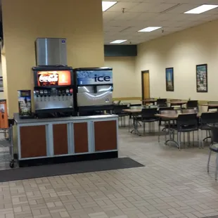 tables, chairs, and a television