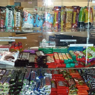 They have tons of candies and gum, mints,  granola bars, all around a buck. Yum