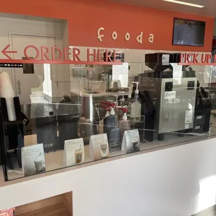 Some coffee options behind the glass and the setup.