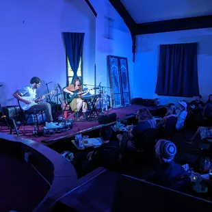 a band playing on stage