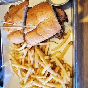 a tray with a sandwich and french fries