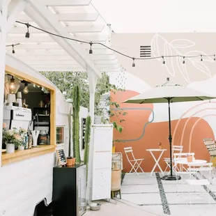 a food truck parked in front of a restaurant