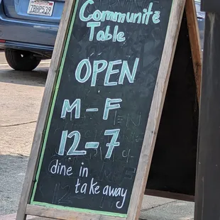 a sign on the sidewalk