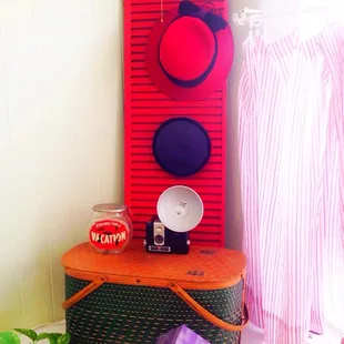 a table with a hat rack