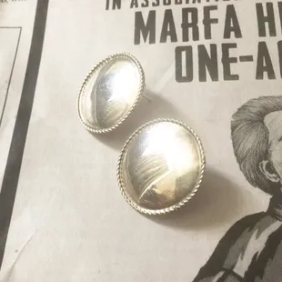 Quarter-sized simple silver studs...love! And very reasonably priced too!!