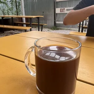 Black coffee on their patio