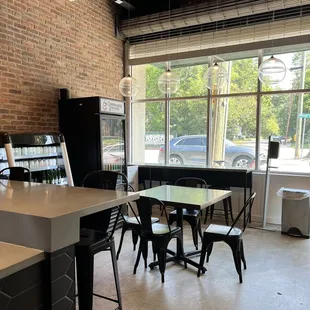 a table and chairs in a coffee shop