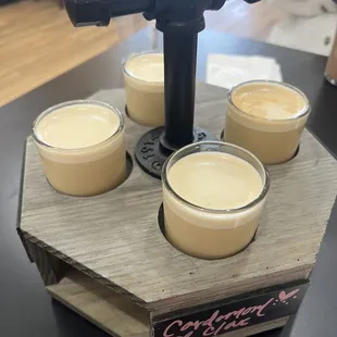 Latte flight with syrup flavors: cardamom clove, orange maple, hazelnut, and rosemary peppercorn. There's sooo many to choose from!