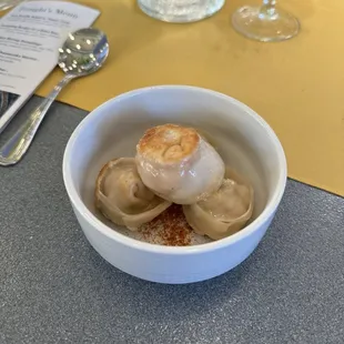 Cajun shrimp dumplings - tail-off and deveined shrimp, garlic butter, egg white, Cajun seasoning, oregano, and scallions