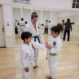 Laurel working with some young students.