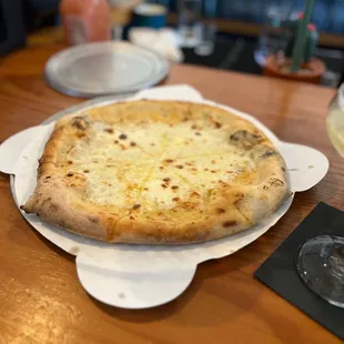 Four cheese (no red base) only way to get it. Add crushed red pepper