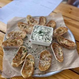 Delicious spinach artichoke dip with crostini