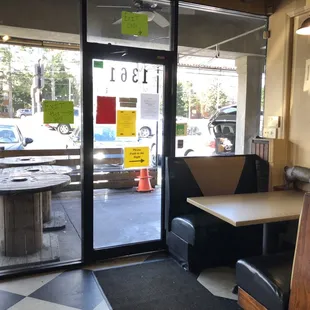 View of the exit door from the inside of the restaurant.