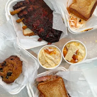 ribs, pulled pork sandwich, 2 sides of mac and cheese, and blueberry bread pudding