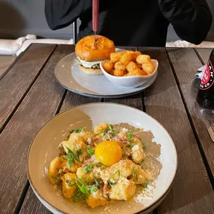 Tator tots, hamburger, cheese curds with bacon, carbonara sauce