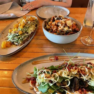 Yellow beet salad (left), Brussels (right), mushroom salad (bottom)