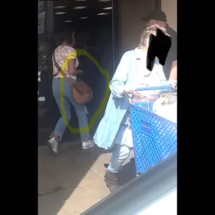 Woman with bag larger then my sons and the security guard looking right at her, never asking her to put it behind the counter.