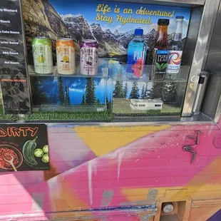 a food truck with a menu on the side