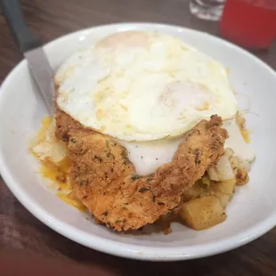 Chicken fried chicken bowl with over medium eggs