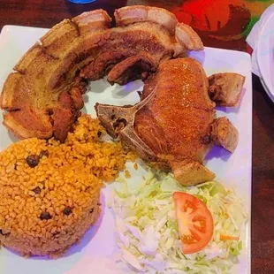 Chuleta Kan Kan with arroz con gandules