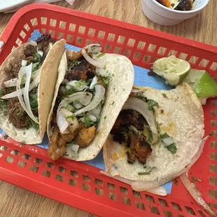 Tacos. Left is Barbacoa Taco, center Chicharron Taco and right is Pastor Taco