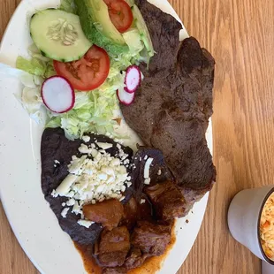 a plate of food and a drink