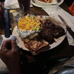 Baked Potato  and 20 Oz. Ribeye